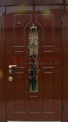 Красивая металлическая дверь со стеклом и ковкой ДСК-33 в Кингисеппе